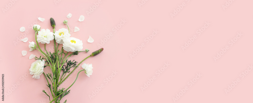 Top view image of white flowers composition over pink pastel background - obrazy, fototapety, plakaty 