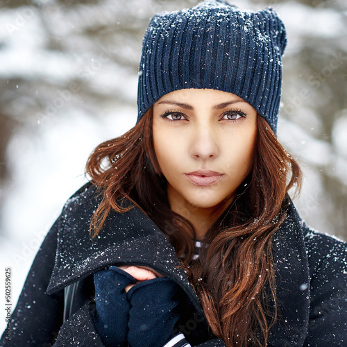 Winter portrait of a beautiful woman close up