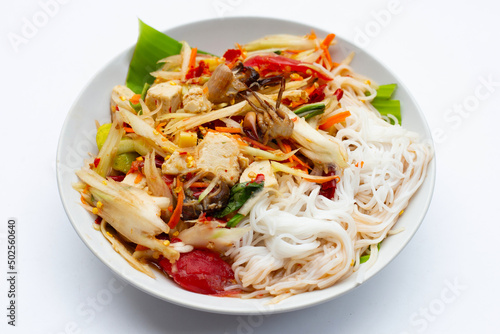 Spicy green papaya salad with vermicelli.