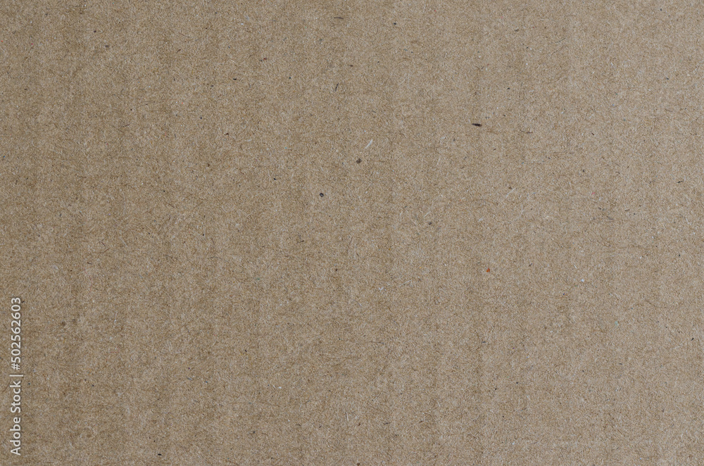 Fototapeta premium Brown cardboard texture. Macro photography cardboard background.