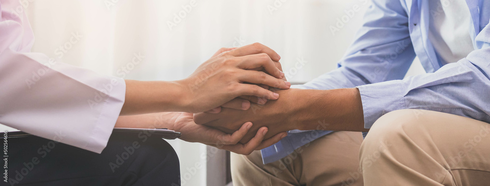 Obraz premium Sickness, asian young patient man, male suffers in ill mental need to therapy with psychologist, consult with woman doctor psychiatrist while sitting on couch, sofa at clinic. Health care people.