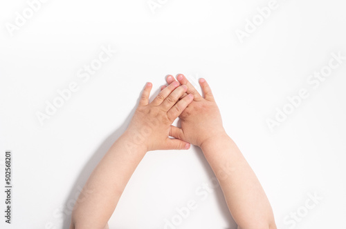 Small child s hands on a white background