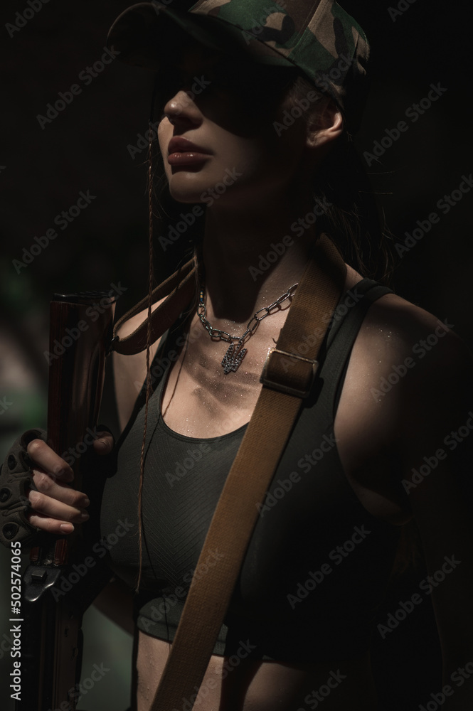 Portrait of a Ukrainian military girl with an AK-74 assault rifle ...