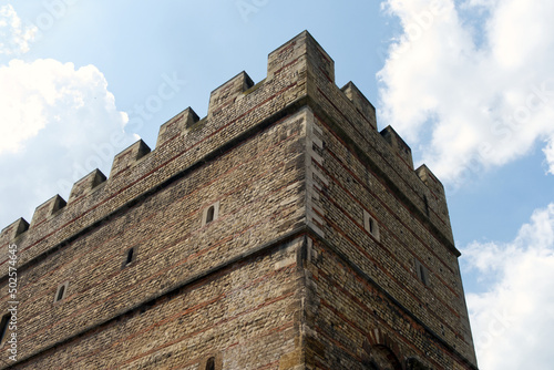 Medieval castle. A castle is a type of fortified structure built during the Middle Ages predominantly by the nobility or royalty and by military orders.