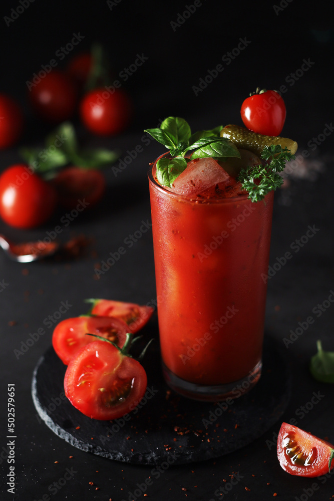 A glass with cold bloody mary cocktail A glass with cold bloody mary cocktail