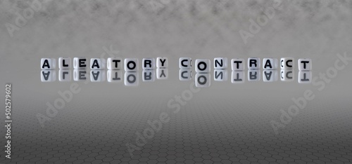 aleatory contract word or concept represented by black and white letter cubes on a grey horizon background stretching to infinity