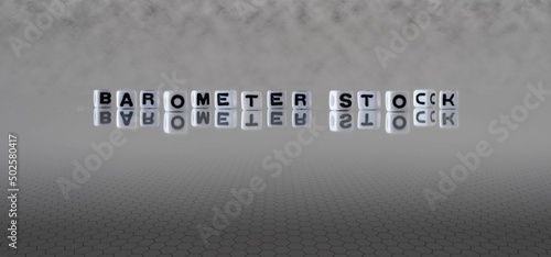 barometer stock word or concept represented by black and white letter cubes on a grey horizon background stretching to infinity