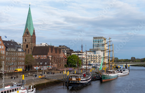 View of Bremen with the River, boats and church
