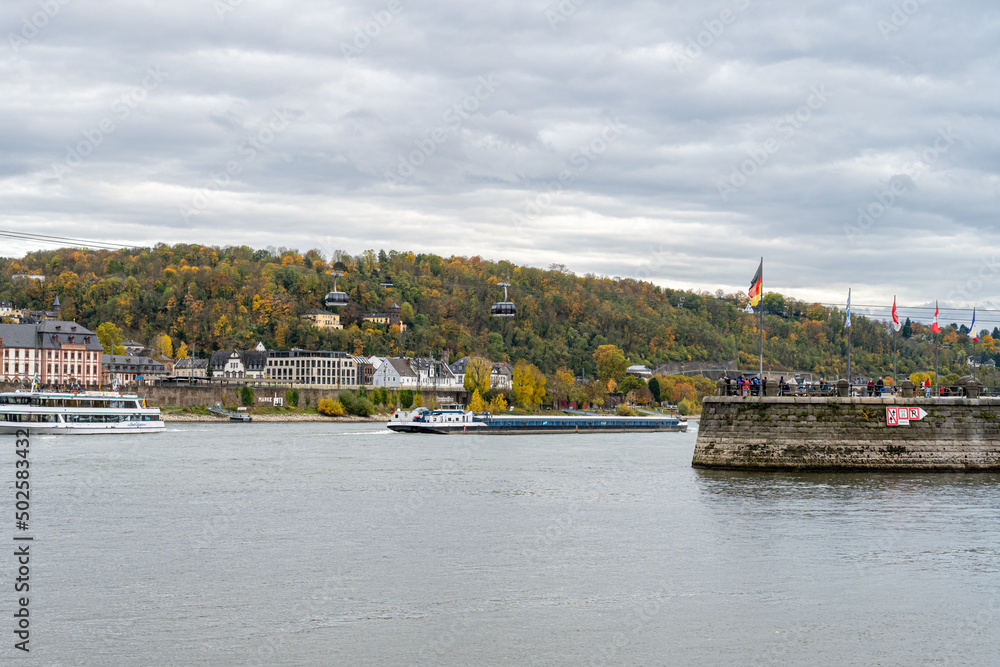 Koblenz were rivers Rhein and Mosel meet. In the foreground the German Corner, a symbol of the unification of Germany with an statue of Emperor William I. In the background the Ehrenbreitstein castle