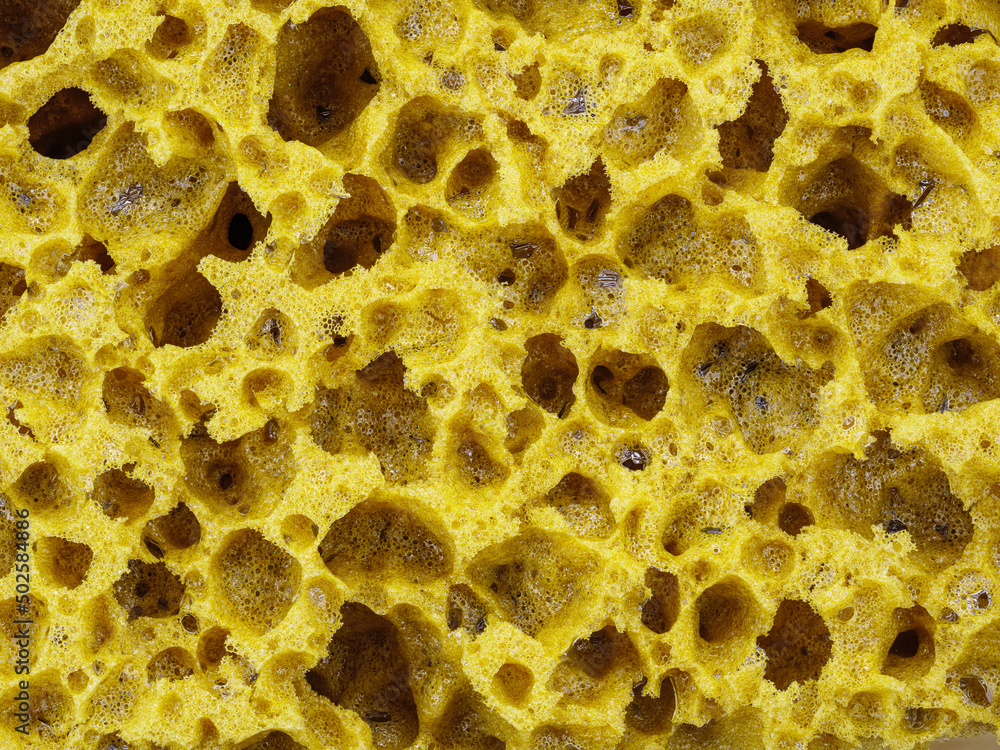 Texture of yellow sponge for decor as abstract background Texture of yellow sponge for decor as abstract background