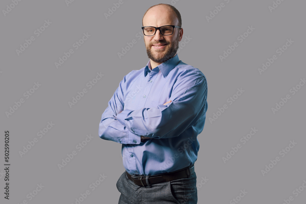 Confident businessman posing with arms crossed Confident businessman posing with arms crossed