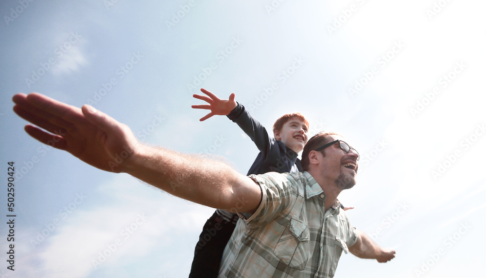 happy father and son have fun together happy father and son have fun together