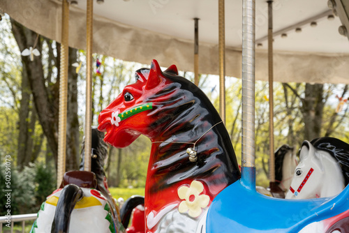 hobbyhorse in a children's carousel © Tatiana