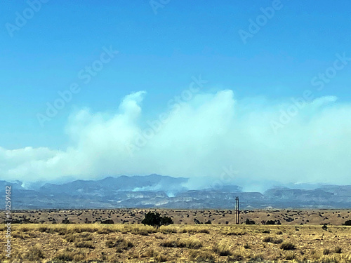 Smoke billows from wildfires in the Jemez Mountains of New Mexico, photographed from I-25 on May 3, 2022 photo