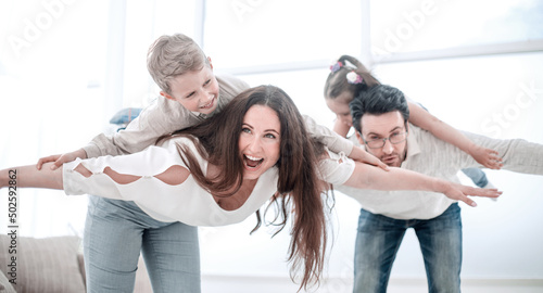 parents have fun with their children on a free evening
