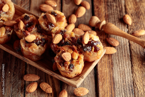 Small cakes with almonds, raisins, and honey.