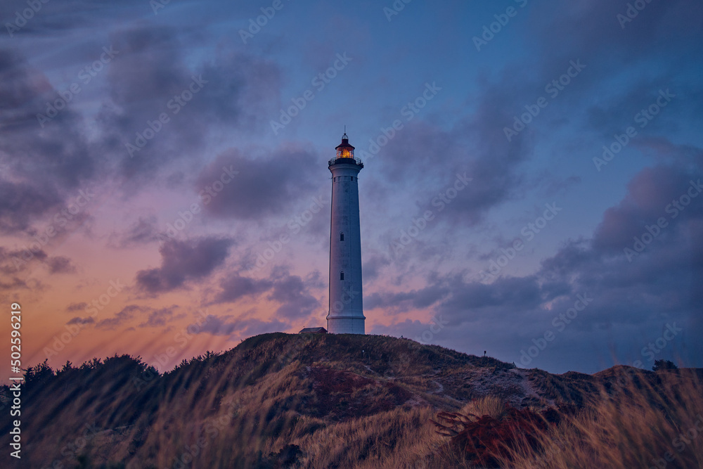 Lighthouse on top of the Dunes at danish coast. High quality photo