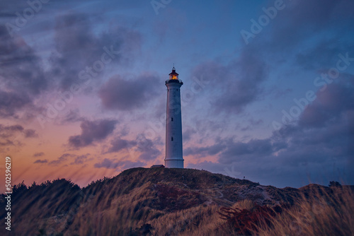 Fotografie, Obraz Lighthouse on top of the Dunes at danish coast