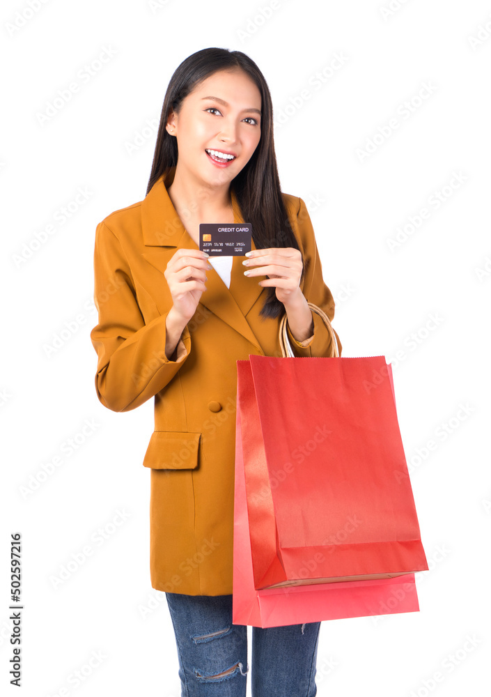 Photo happy positive pretty asian woman smile holding a credit card, payment credit card for confident lifestyle concept advertising white background Photo happy positive pretty asian woman smile holding a credit card, payment credit card for confident lifestyle concept advertising white background