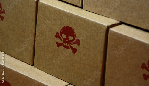 Skull piracy and danger symbol stamp and stamping photo