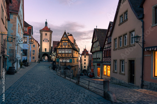 romantic Rothenburg ob der Tauber in the evening with city lights