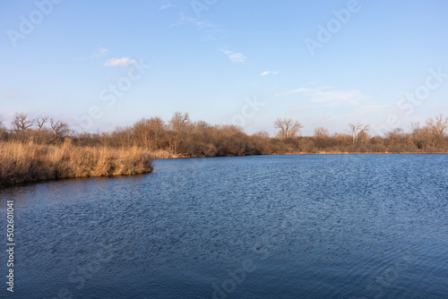 Landscape of a Water Filled Quarry in Suburban Lemont Illinois during Autumn