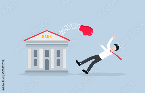 Bankruptcy due to financial crisis, business failure ,or mistake opportunity, unable to survive during economic recession concept. Bank knocking down failed depressed businessman to ground.