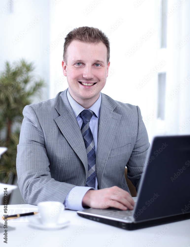 Handsome businessman is working in a office