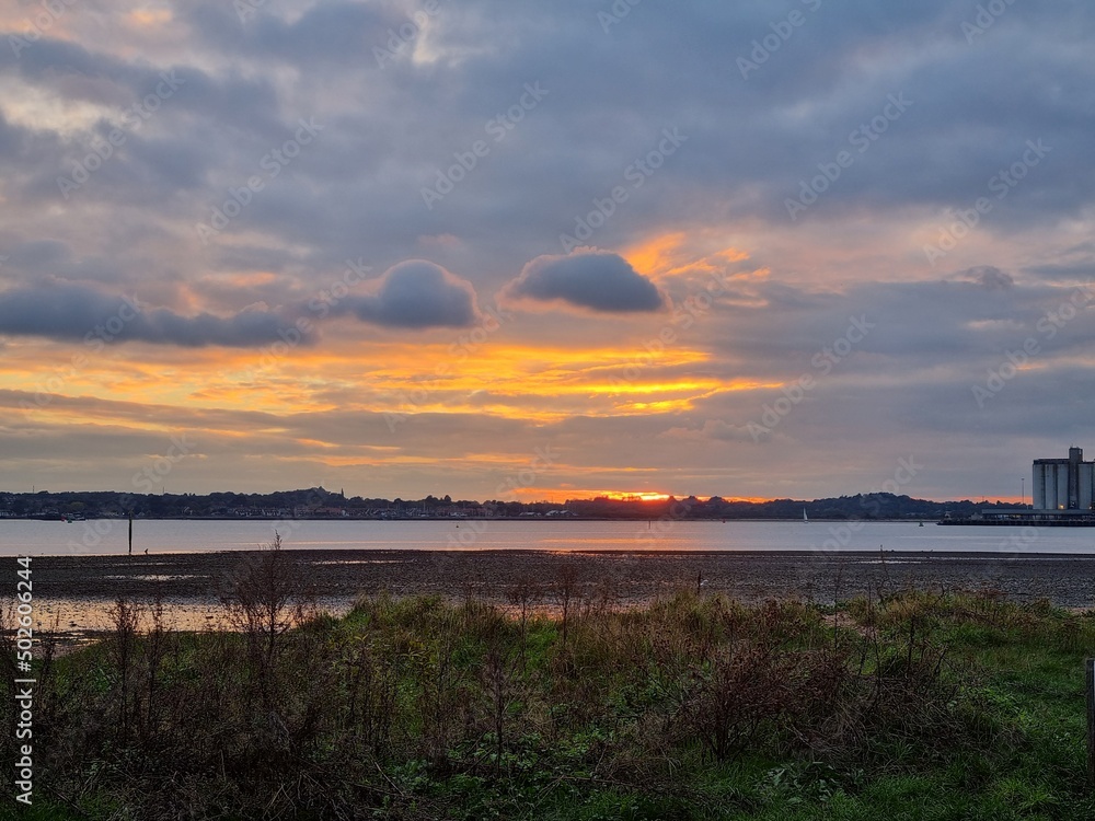 Obraz premium sunset over the river