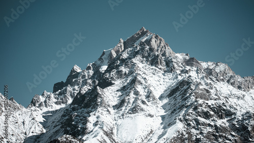 Tableau sur toile Low angle view of snow covered mountain.