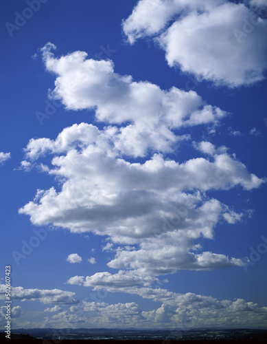 Cumulus cloud in a blue sky photo