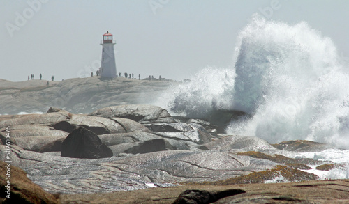 Canada, Nova Scotia, Peggy's Cove, High surf after hurricane crashing on rocks photo