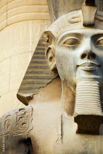 Egypt, Luxor, Luxor Temple, Close up of Colossal Seated Statue of Ramses II photo