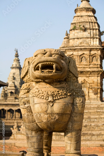 Nepal, Bhaktapur, Durbar Square, Vatsala Durga and Vatsala Temples, Stone lion, UNESCO World Heritage Site photo