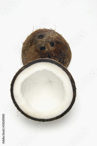 Close-up of two halves of a coconut