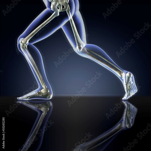 Man's legs running in blue X-ray on a dark blue reflective background photo