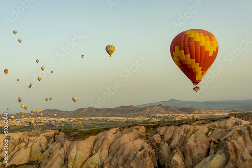Travel in hot air balloon over Goreme village in Turkey
