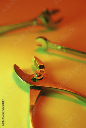 Close-up of pliers and a wrench