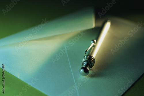 Close-up of a pen on an envelope photo