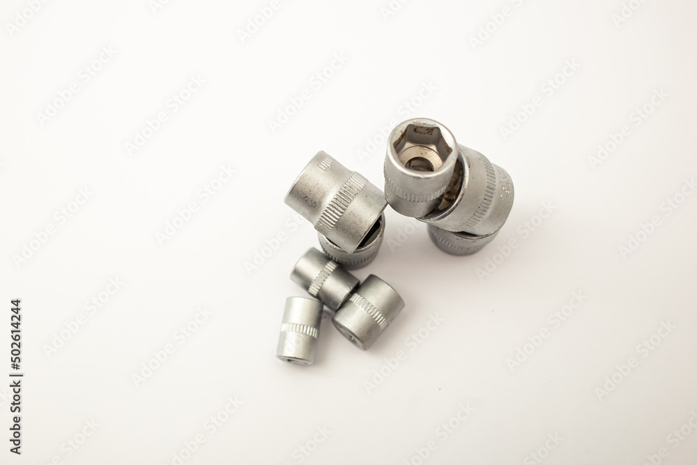 Construction tools, wrench heads on white background Construction tools, wrench heads on white background