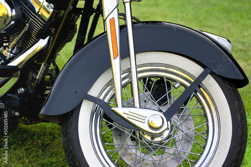 Close-up of a wheel of Harley Davidson motorcycle