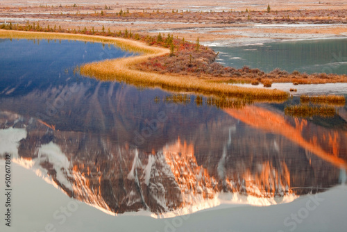 Reflection of a mountain in a river, Sunwapta River, Mount Kitchener, Jasper National Park, Alberta, Canada photo