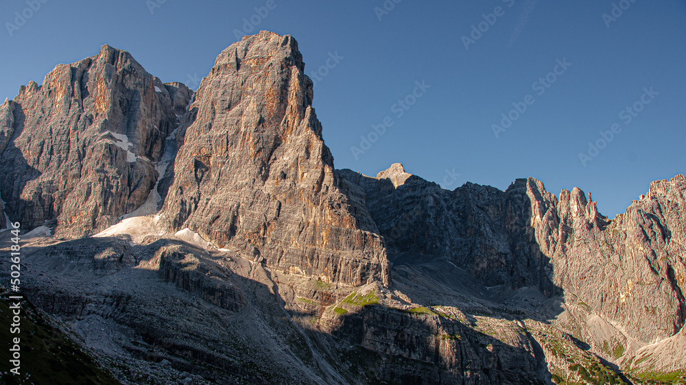 Obraz premium Cima Tosa mountain with Crozzon di Brenta pillar as seen from the trail to Rifugio Brentei in Brenta Dolomites, Dolomites, Southern Limestone Alps, Trentino, Alto Adige, Trento, Italy 