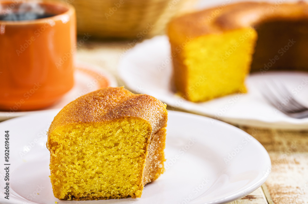 slice of cornmeal cake, traditional corn cake from Brazil in the June festivities slice of cornmeal cake, traditional corn cake from Brazil in the June festivities