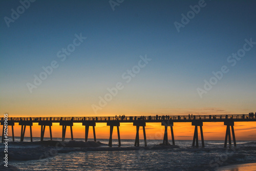 sunset over the pier