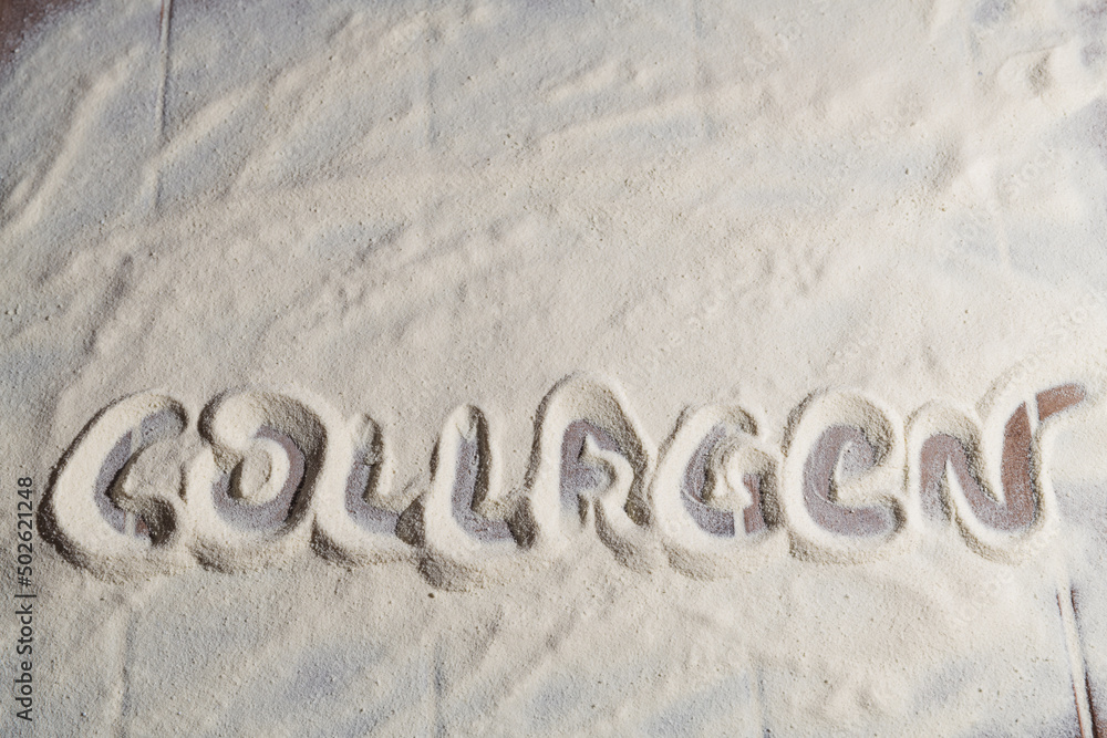 Fototapeta premium Collagen powder background. Collagen inscription. Top view, flat lay.