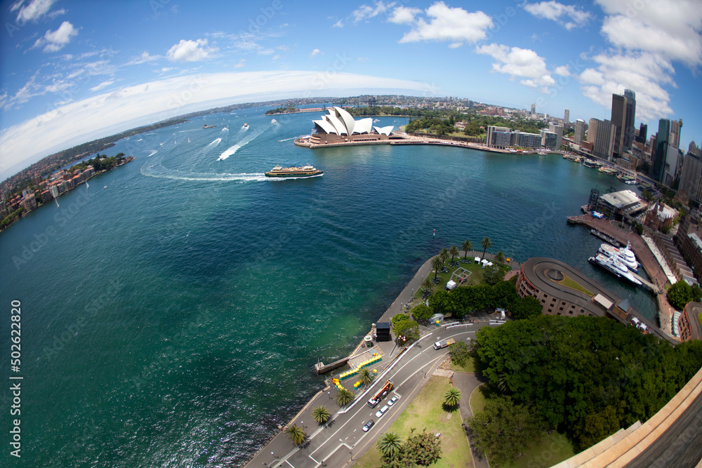 Aerial view of a harbor, Sydney Harbor, Sydney opera house, Sydney, New South Wales, Australia Aerial view of a harbor, Sydney Harbor, Sydney opera house, Sydney, New South Wales, Australia