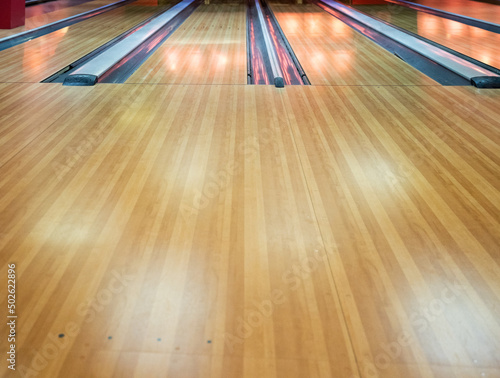 Wooden bowling alley floor close up