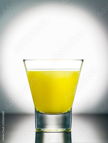 Close up of a glass of orange juice photo