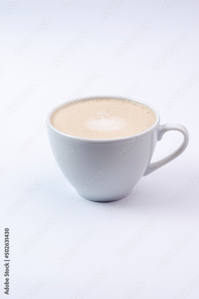 A Cup of Cappuccino with froth, isolated on a white background A Cup of Cappuccino with froth, isolated on a white background